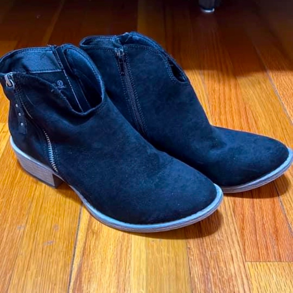 Black zip up booties.